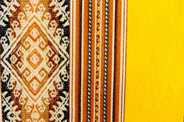 Close-up macro of fabric with Peruvian design