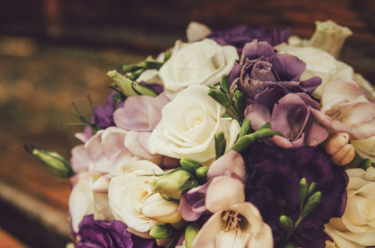 wedding bouquet of beige white violet flowers © Александра Вишнева