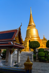 Fototapeta premium Golden Pagoda in Temple of the Emerald Buddha (Wat Phra Kaew), Bangkok