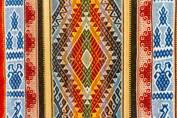 Close-up of a colorful fabric with Peruvian design