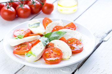Light Italian Lunch tomato mozzarella cheese salad caprese basil olive oil  