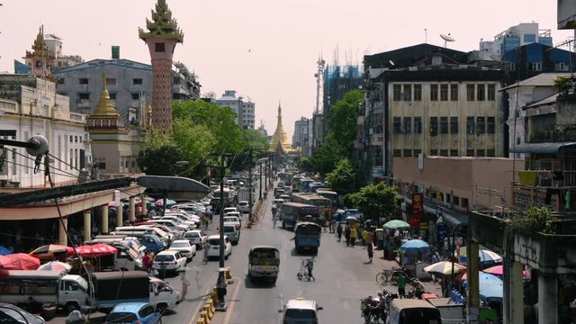 Traffic jam near Sula Pagoda which is located in the heart of downtown Yangon, Myanmar