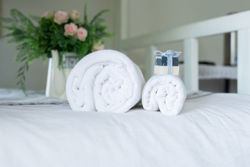 White hotel  towel on bed,Stack of fluffy bath towels