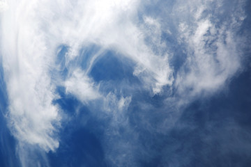 white clouds in a blue sky