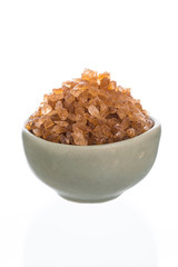 Brown rock sugar isolated on white