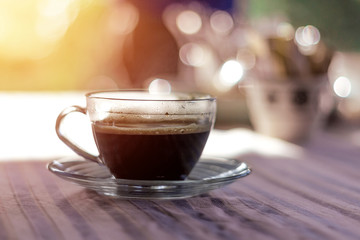 Cup of coffee on table in coffee shop 