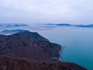 Fototapeta na wymiar Aerial view of mountains, islands and sea