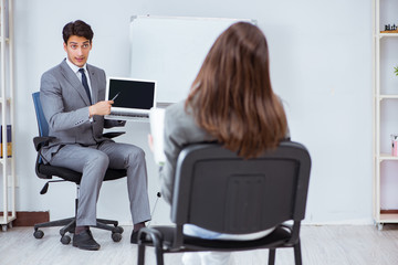 Business presentation in the office with man and woman