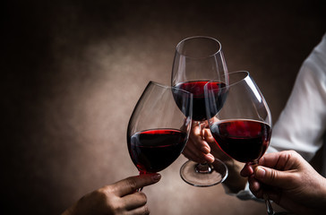 toasting with wine glasses © taa22
