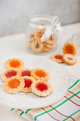 Cookies with jam in a glass jar 