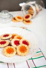 Cookies with jam in a glass jar 