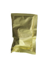 Close up of golden aluminum bags on white background.