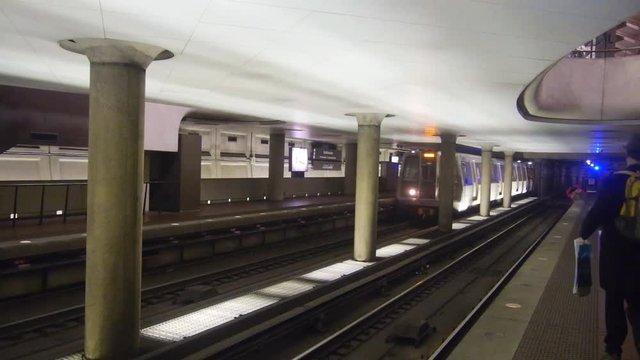 Subway Arriving In Station - Pan - Right To Left