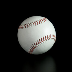 baseball ball on black background.