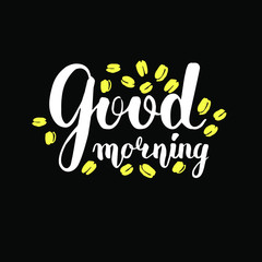 Vector lettering good morning. White text on a black background. Yellow coffee beans. Handwritten calligraphy