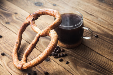 pretzel and cup of coffe