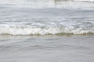 sea  shore waves track sand