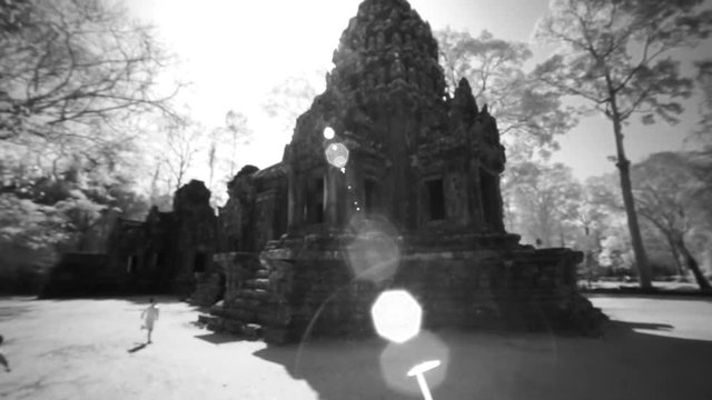 Fast steadicam gimbal moving around the Wat Thommanon in the Angkor Wat architectural world heritage site.