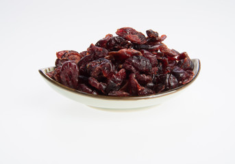 dried cranberries or dried fruits on a background.