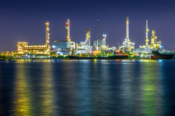 Fototapeta na wymiar Industrial view at oil refinery plant form industry zone at the Chaophaya river in Bangkok Thailand