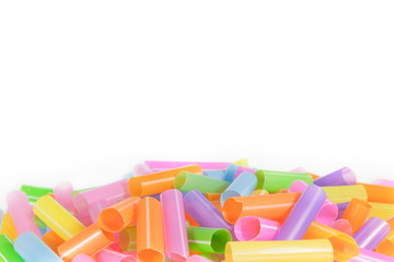 Plastic drinking straw / Heap of colorful plastic drinking straw on white background with copy space.