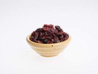 dried cranberries or dried fruits on a background.