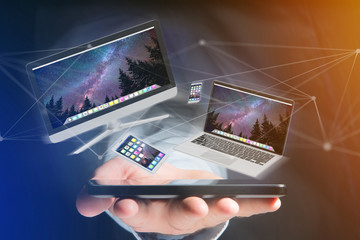Obraz na płótnie Canvas Devices like smartphone, tablet or computer flying over connection network - 3d render