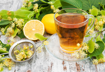 cup of herbal tea with linden flowers