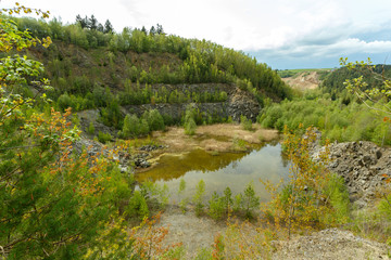 Fototapeta na wymiar abandoned flooded quarry, Czech republic