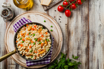 Delicious risotto with chicken and green peas.