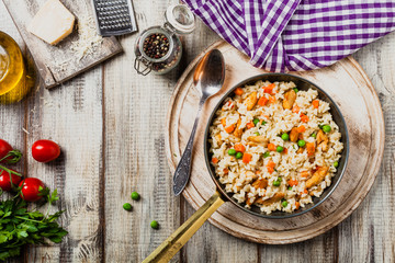 Delicious risotto with chicken and green peas.