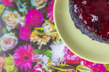 A piece of poppy cherry cake on a plate.