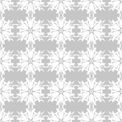 White floral seamless pattern on gray background