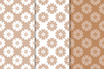 Brown floral backgrounds. Set of seamless patterns