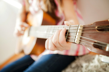 Music woman play acoustic guitar
