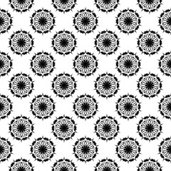 Black floral seamless design on white background