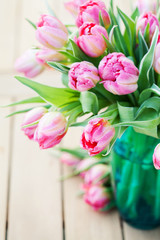 Bouquet of beautiful pink tulips in vase