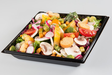 Salad plastic container in white background