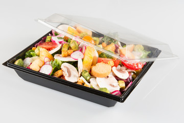 Takeaway food salads in plasmasovy ware