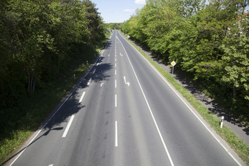 aerial of street with arrows as transportation symbol