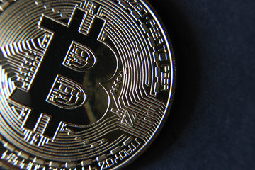 Golden Bitcoins. New virtual money. Blurred Bitcoin