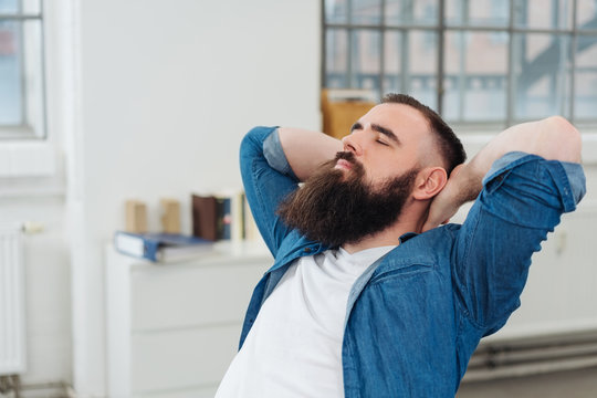 Bearded man taking a moment to relax