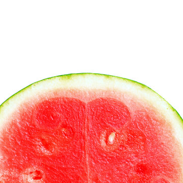 Ripe, juicy, pink, sweet of watermelon close-up isolated on white background. Macro. Seedless watermelon background. Big red berry in a cut. Citrullus lanatus, cucurbitaceae