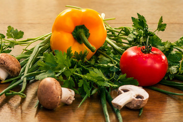 Set of fresh natural products with pepper, tomato, mushrooms, onion and parsley