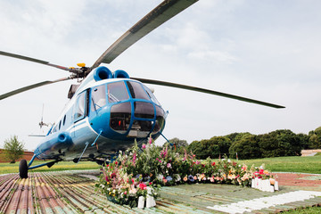 Wedding arch for registration on the helipad.
