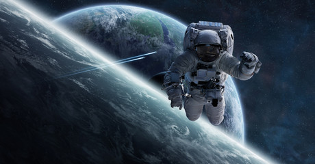 Astronaut floating in space 3D rendering elements of this image furnished by NASA - obrazy, fototapety, plakaty