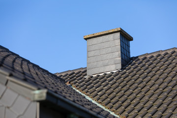 chimney roof house with blue sky