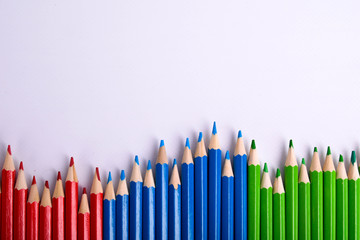  Colorful pencils pattern isolated on white background. Top view colorful of color pencils.Colored pencils, isolated on the white background. Color pencil with copy space isolated on white background,