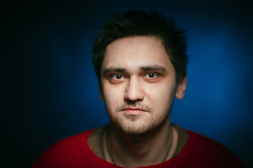 Obraz premium emotional young man photo in studio
