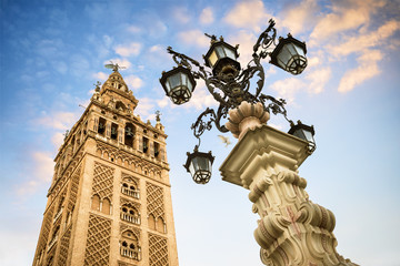 The Giralda, bell tower of the Cathedral of Seville in Seville, Andalusia, Spain - obrazy, fototapety, plakaty